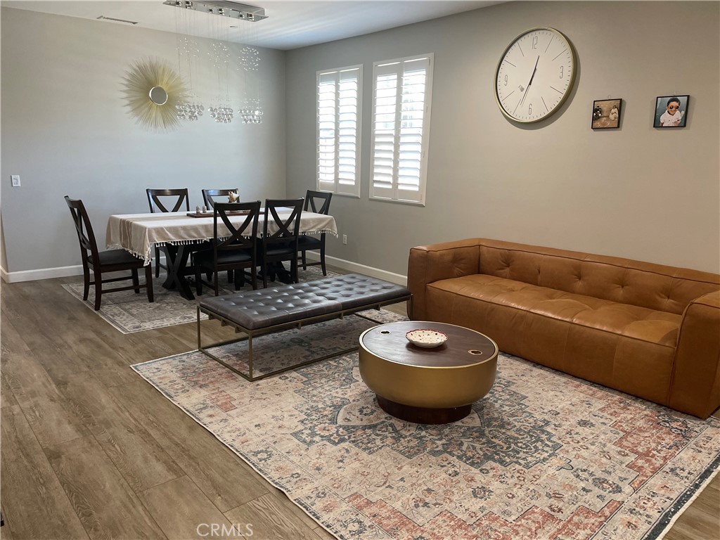 1563 Silver Shadow Drive Thousand Oaks, CA 91320 - Photo 6 of 24 a living room with furniture a rug and a window