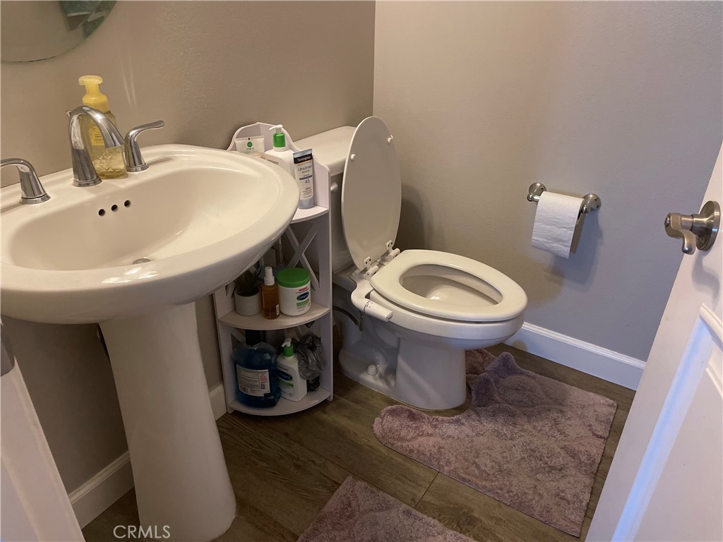 1563 Silver Shadow Drive Thousand Oaks, CA 91320 - Photo 8 of 24 a bathroom with a sink and a toilet