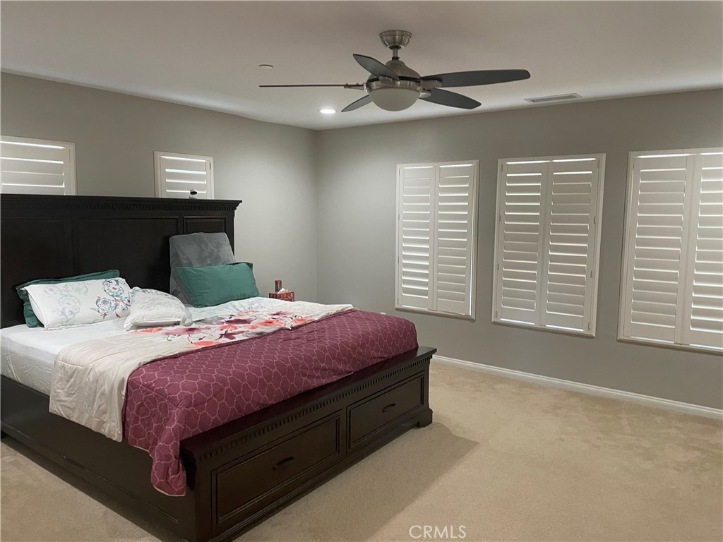 1563 Silver Shadow Drive Thousand Oaks, CA 91320 - Photo 10 of 24 a bedroom with a bed and window