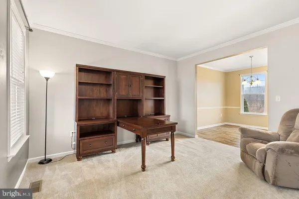 a livingroom with furniture and windows