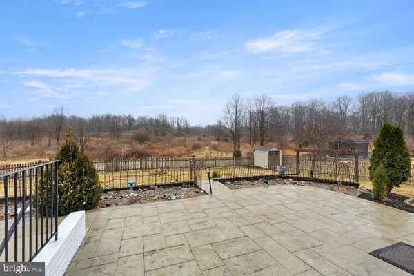 a view of a terrace with a bench