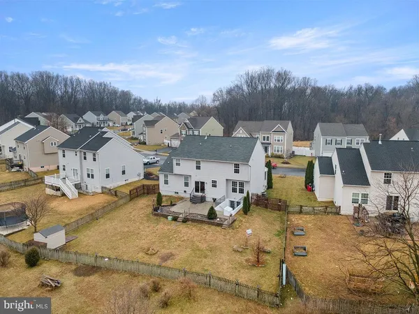 an aerial view of a lake with mountain view