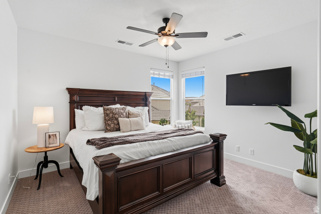 2278 Tawny Ridge Circle St. George, UT 84790 - Photo 44 of 61 Spacious room featuring neutral carpeting, a ceiling fan with integrated lighting, recessed lighting, and white baseboards.