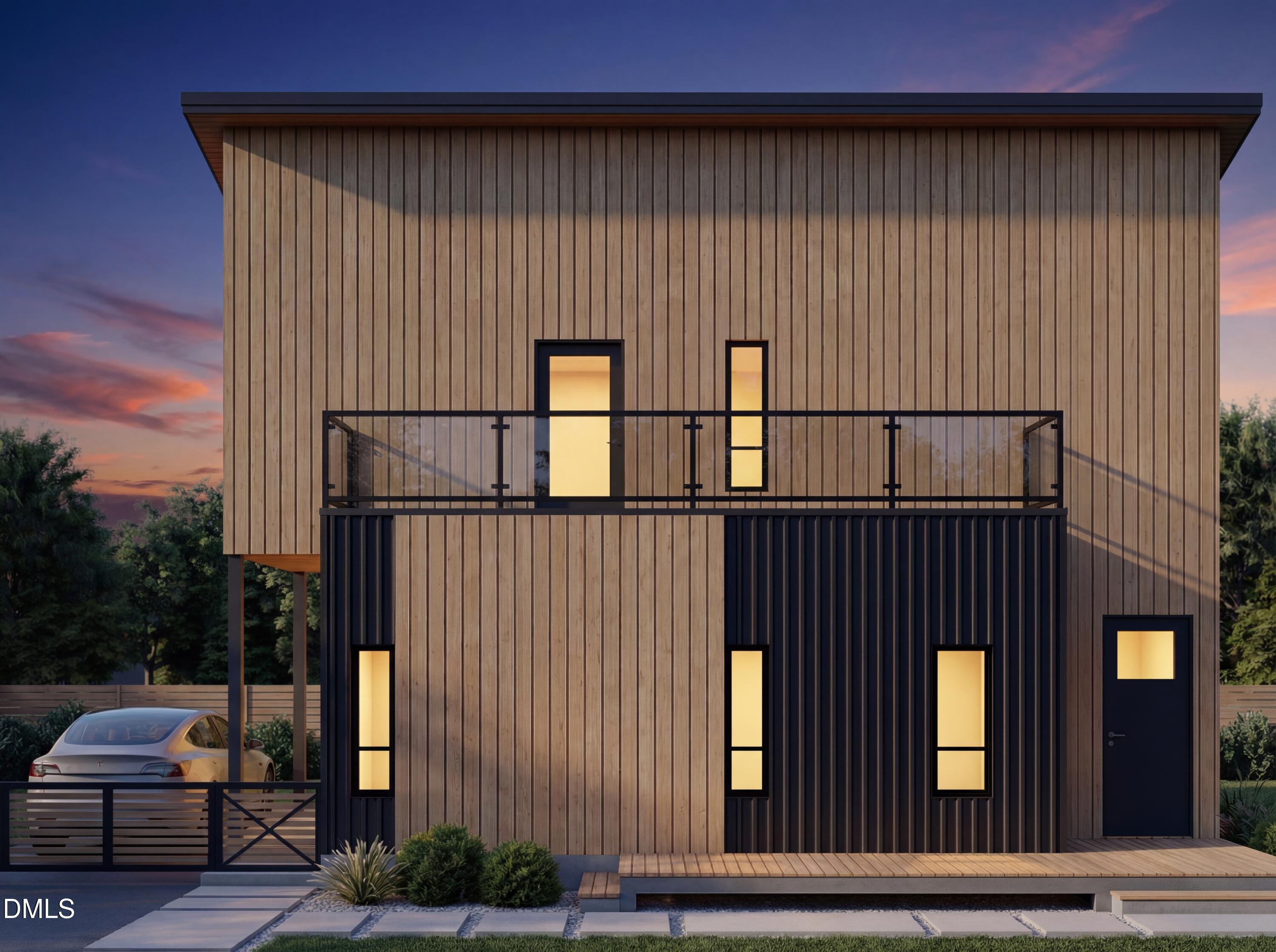 1222 Merrick Street Durham, NC 27707 - Photo 2 of 13 a side view of a house with a wooden fence