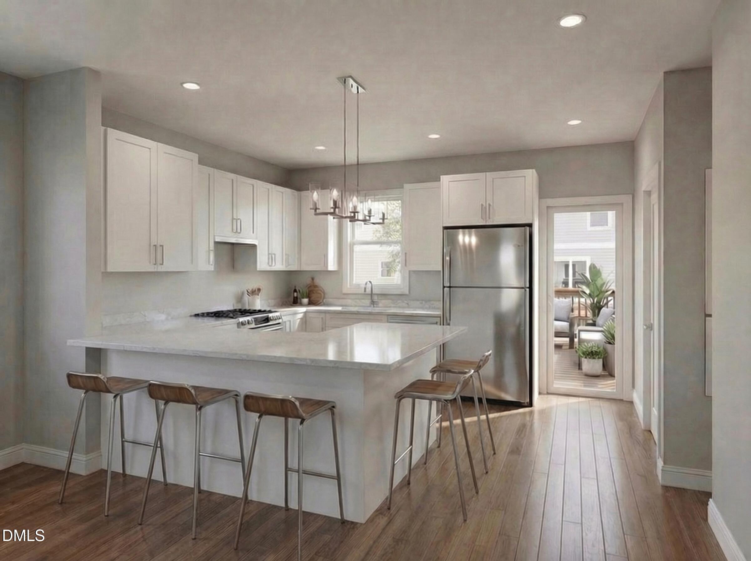 1222 Merrick Street Durham, NC 27707 - Photo 3 of 13 a kitchen with stainless steel appliances granite countertop a refrigerator a sink dishwasher a stove and white cabinets with wooden floor