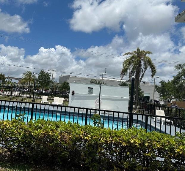 16450 Northwest 2nd Avenue, Unit 218 Miami, FL 33169 - Photo 11 of 16 a view of a garden