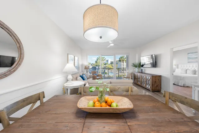 a bed room with a bed and a large window