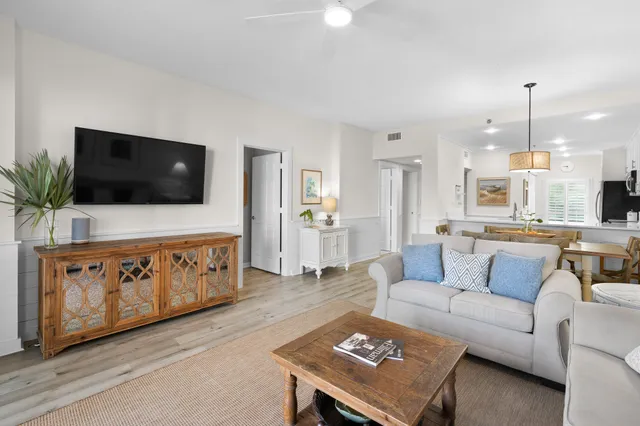 a bathroom with double sink and a mirror
