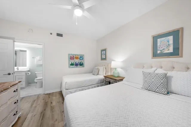 a view of a chairs and table in a backyard
