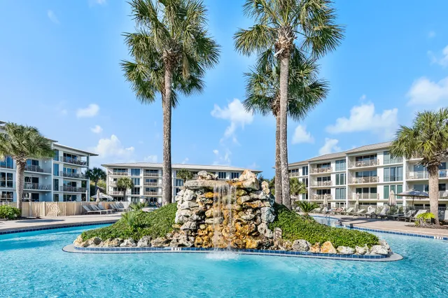 a view of a back yard from a balcony