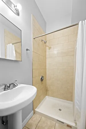 a living room with furniture a table and a flat screen tv