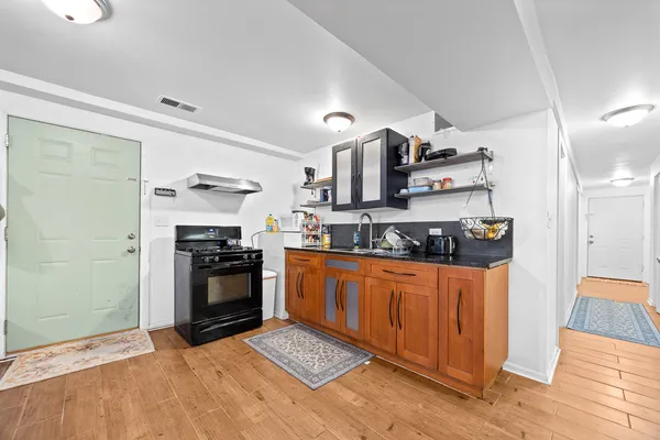 a bedroom with a bed and a table in it