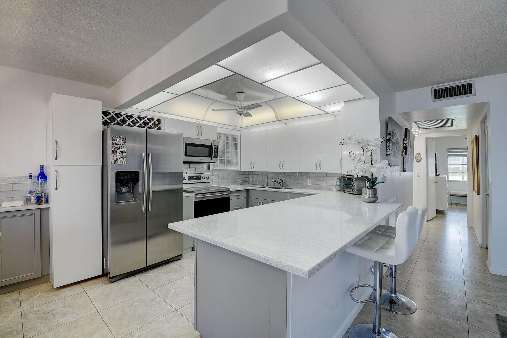 1031 Rexford B Boca Raton, FL 33434 - Photo 4 of 44 50aebfbb0cce361d3dd1452e6133155b_1718769