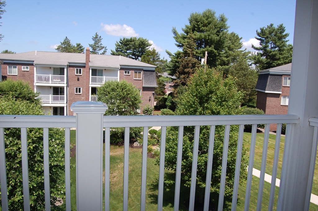 48 Will Drive, Unit 72 Canton, MA 02021 - Photo 15 of 19 a view of a balcony with lake view