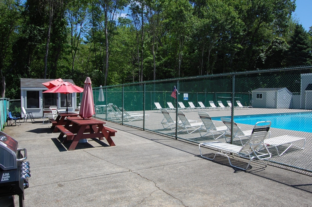 48 Will Drive, Unit 72 Canton, MA 02021 - Photo 16 of 19 a view of a park with sitting area