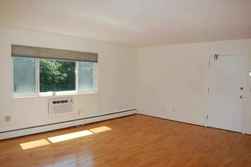 48 Will Drive, Unit 72 Canton, MA 02021 - Photo 9 of 19 an empty room with a window