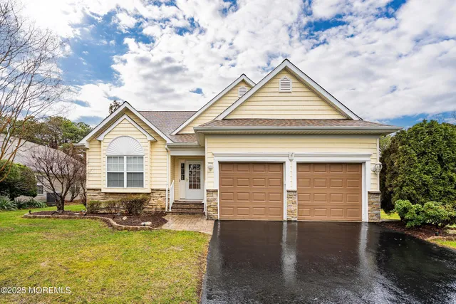 a view of a house with swimming pool and porch