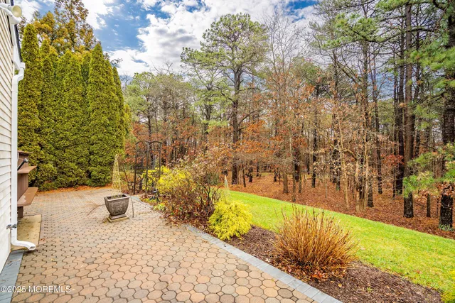 a view of a backyard of the house