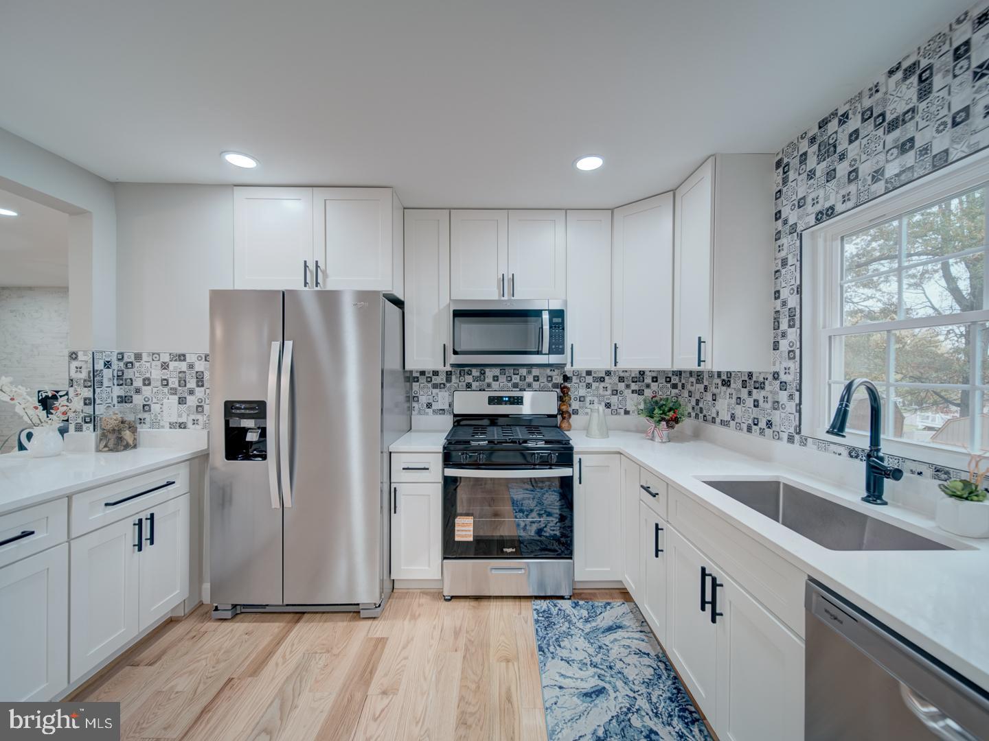 112 Courtney Drive Elkton, MD 21921 - Photo 15 of 40 a kitchen with a sink appliances and cabinets