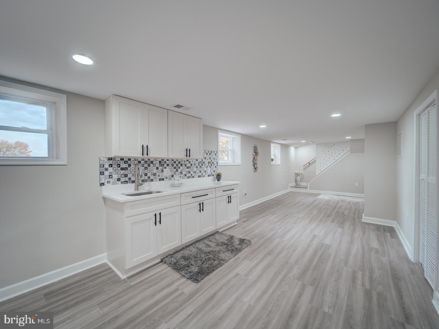112 Courtney Drive Elkton, MD 21921 - Photo 29 of 40 a bathroom with a sink and a mirror