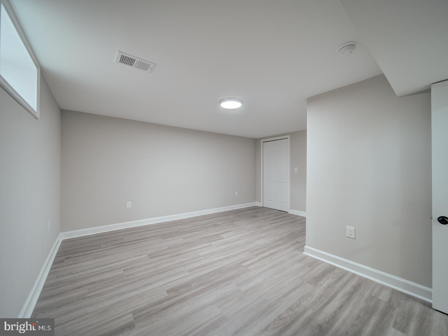 112 Courtney Drive Elkton, MD 21921 - Photo 30 of 40 a view of an empty room with wooden floor