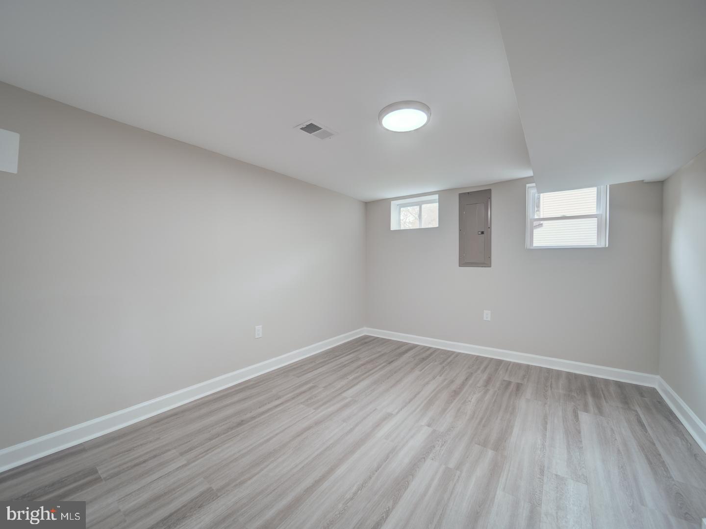 112 Courtney Drive Elkton, MD 21921 - Photo 33 of 40 wooden floor in an empty room with a window