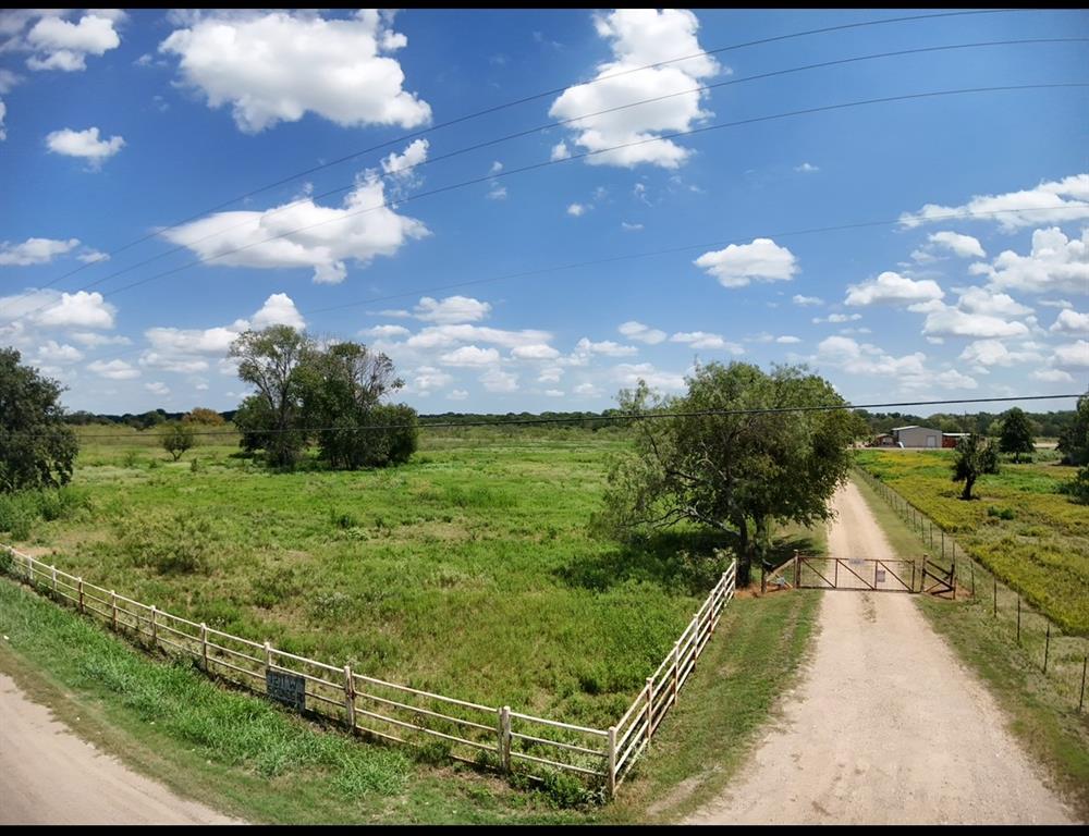 1211 West Simonds Road Seagoville, TX 75159 - Photo 2 of 6 a view of a yard
