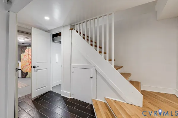 a view of a hallway with staircase