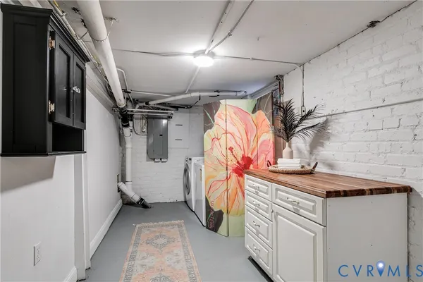 a view of storage and utility room with a lot of stuff