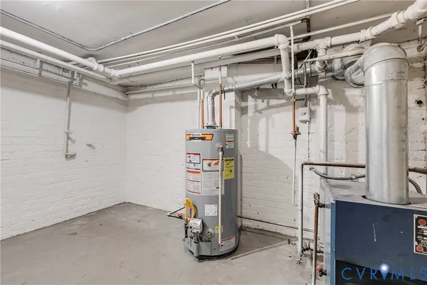 a view of a brick house with many windows