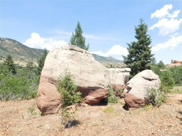 a view of a covered with snow in the background