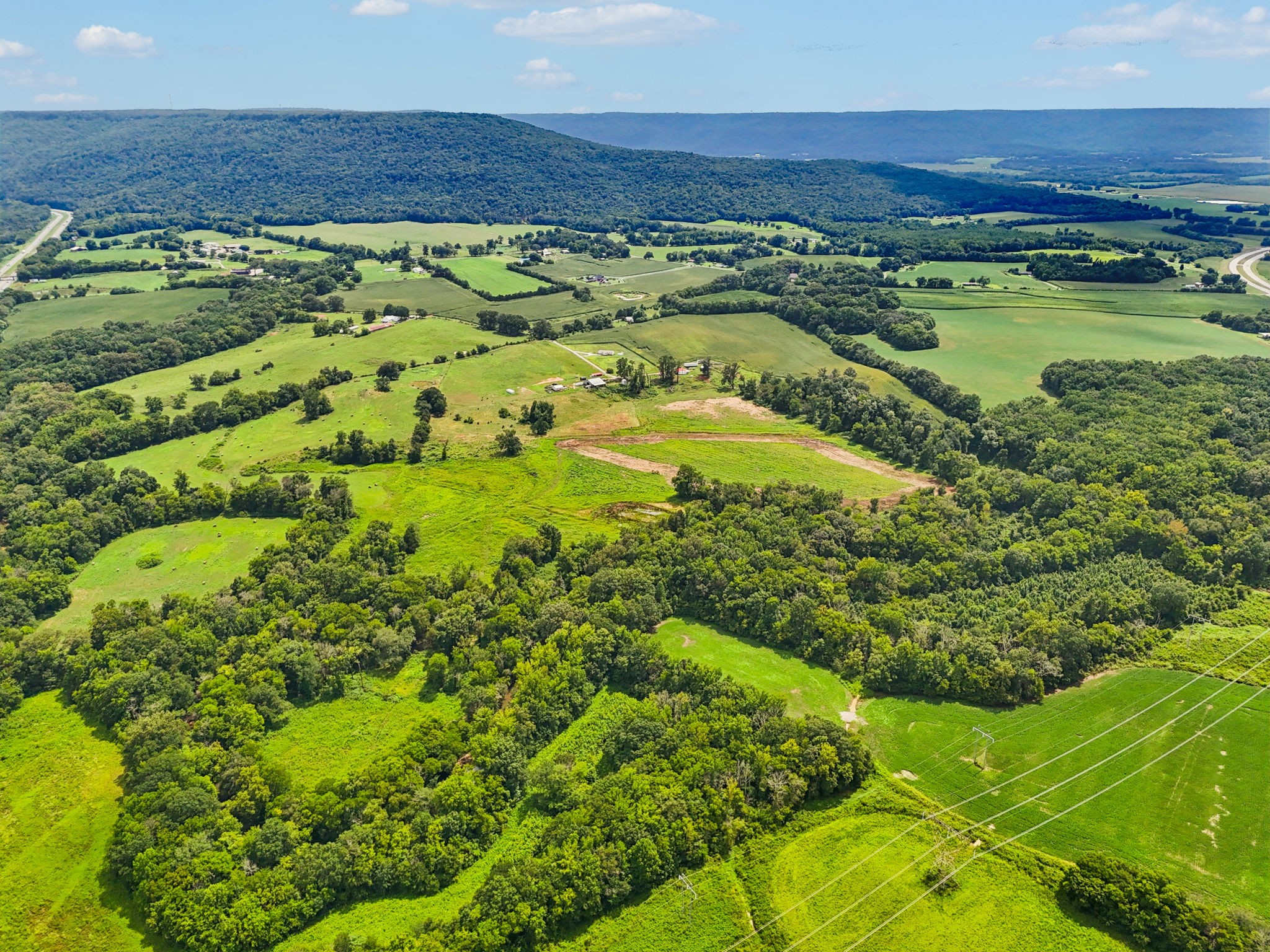 0 Laxton Road Pelham, TN 37366 - Photo 2 of 4 a view of a water pond with green field