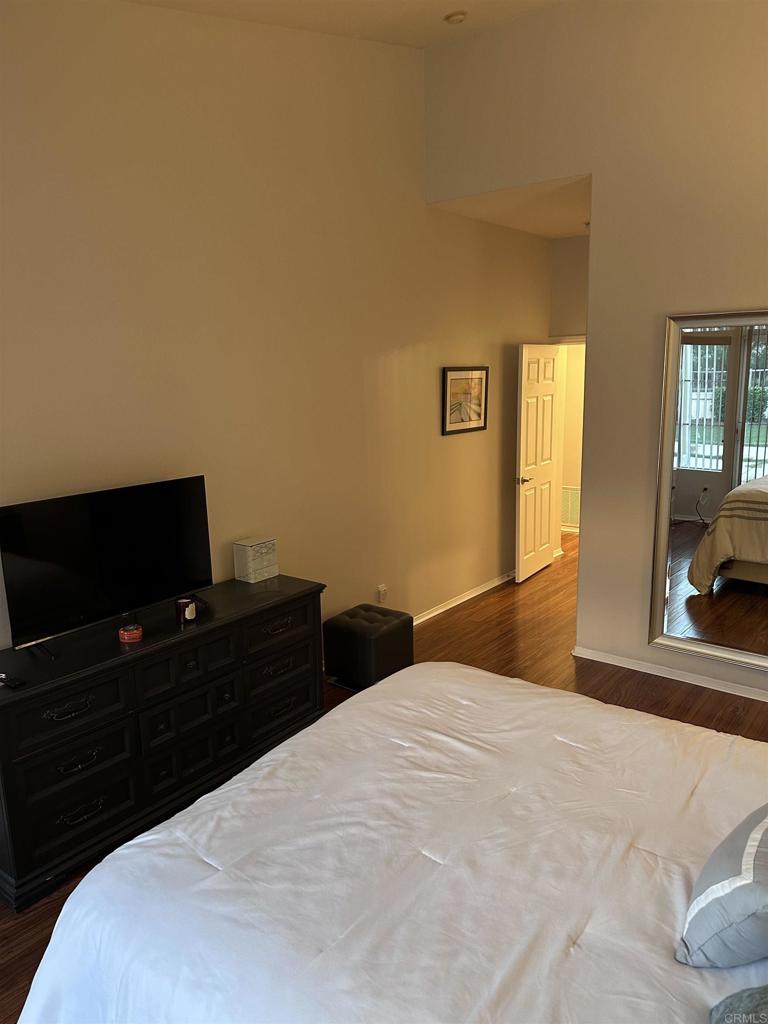 2547 La Costa Avenue Chula Vista, CA 91915 - Photo 12 of 17 a bedroom with a bed and a flat screen tv