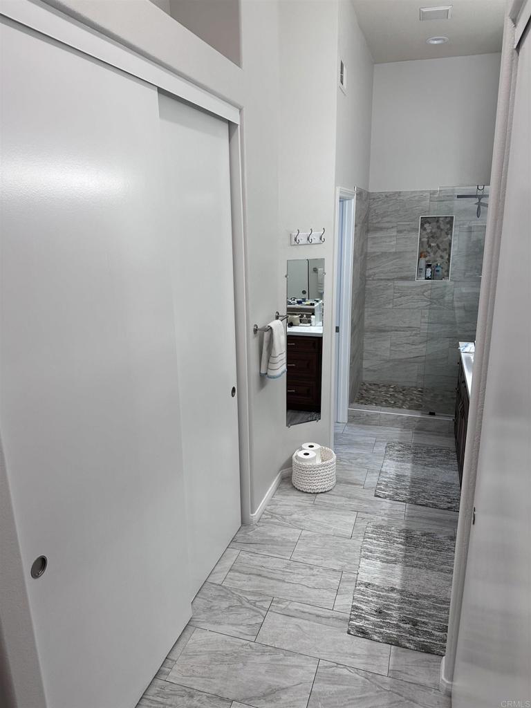 2547 La Costa Avenue Chula Vista, CA 91915 - Photo 13 of 17 a bathroom with a shower and a sink