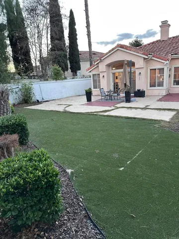 a view of a house with a swimming pool