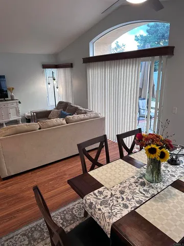 a living room with furniture and a table