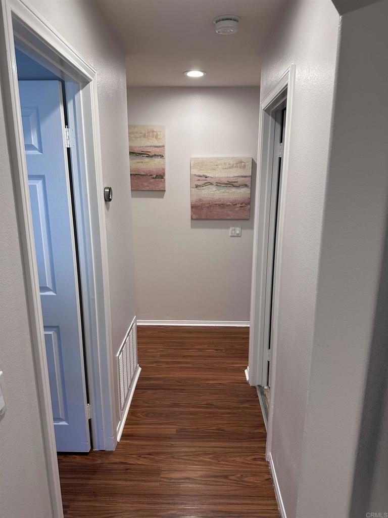 2547 La Costa Avenue Chula Vista, CA 91915 - Photo 8 of 17 a view of a hallway with wooden floor
