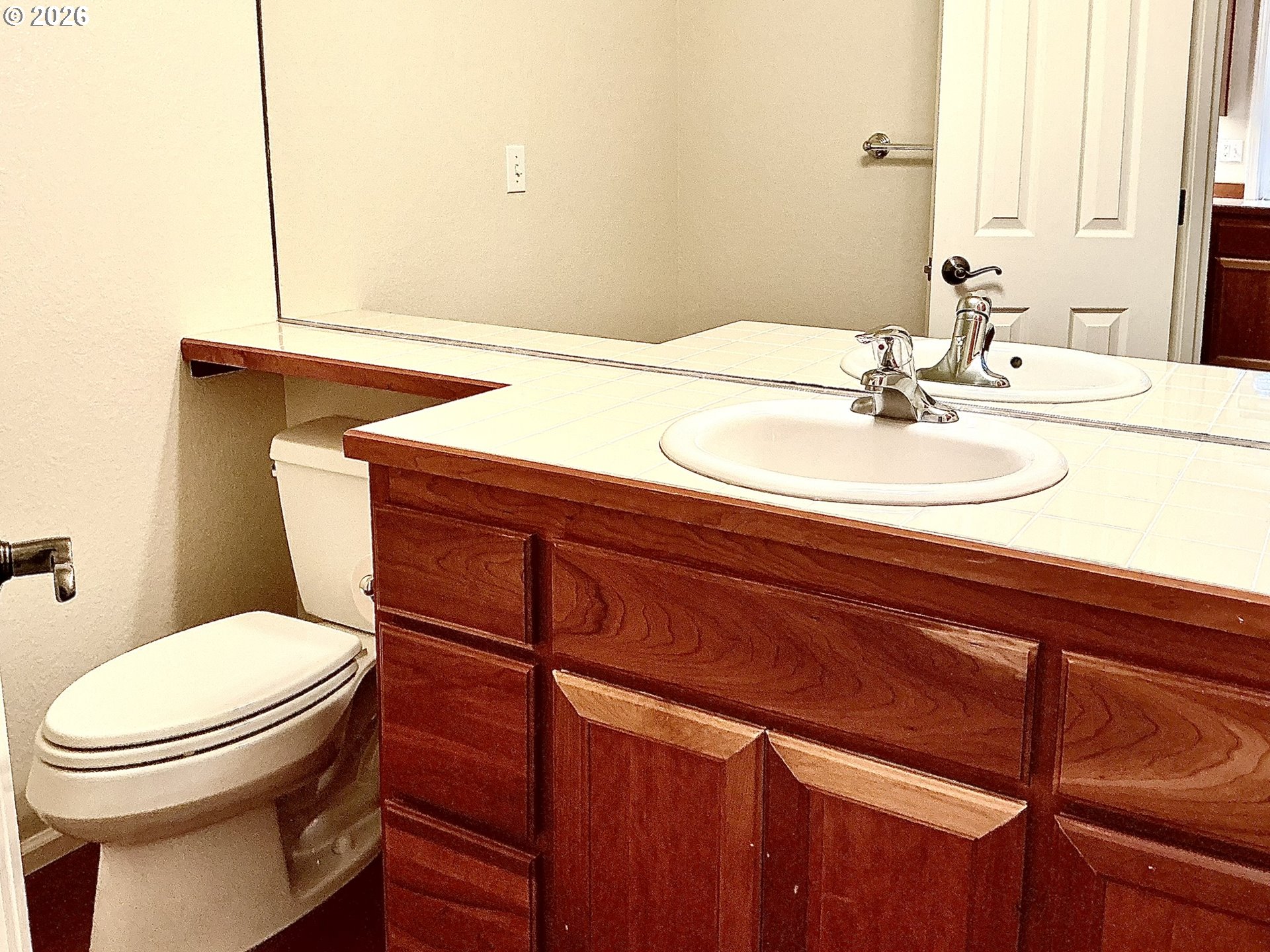 25335 Trinity Street Veneta, OR 97487 - Photo 11 of 27 a bathroom with a sink and a mirror