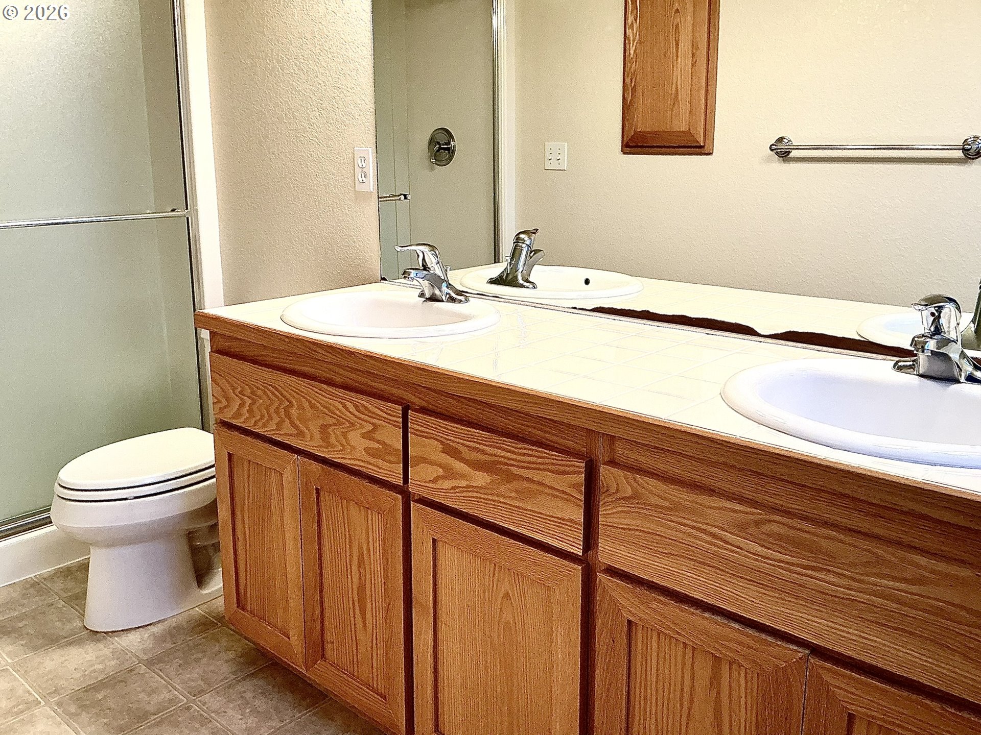 25335 Trinity Street Veneta, OR 97487 - Photo 17 of 27 a bathroom with a sink and a toilet