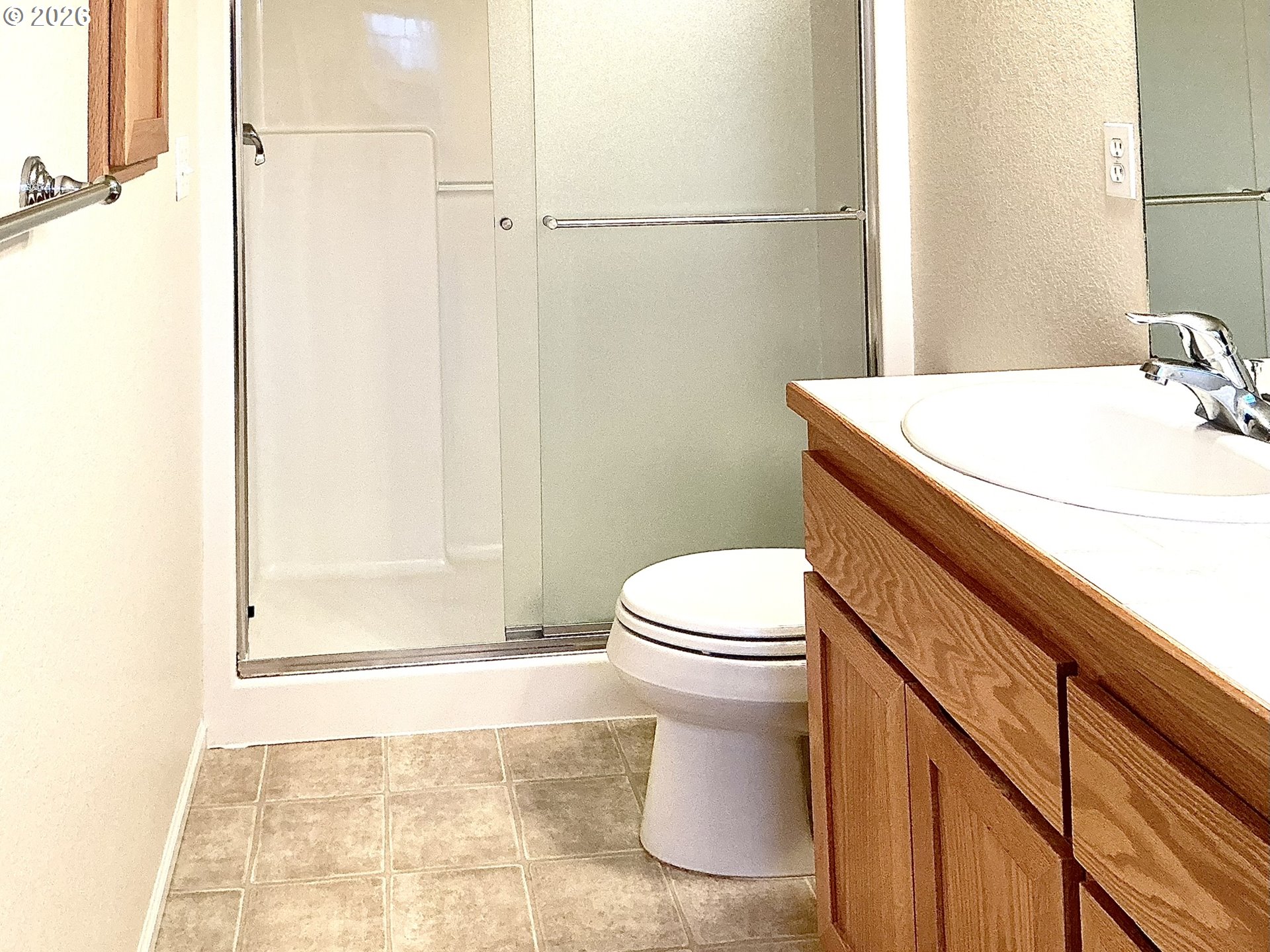 25335 Trinity Street Veneta, OR 97487 - Photo 18 of 27 a bathroom with a sink a toilet and shower