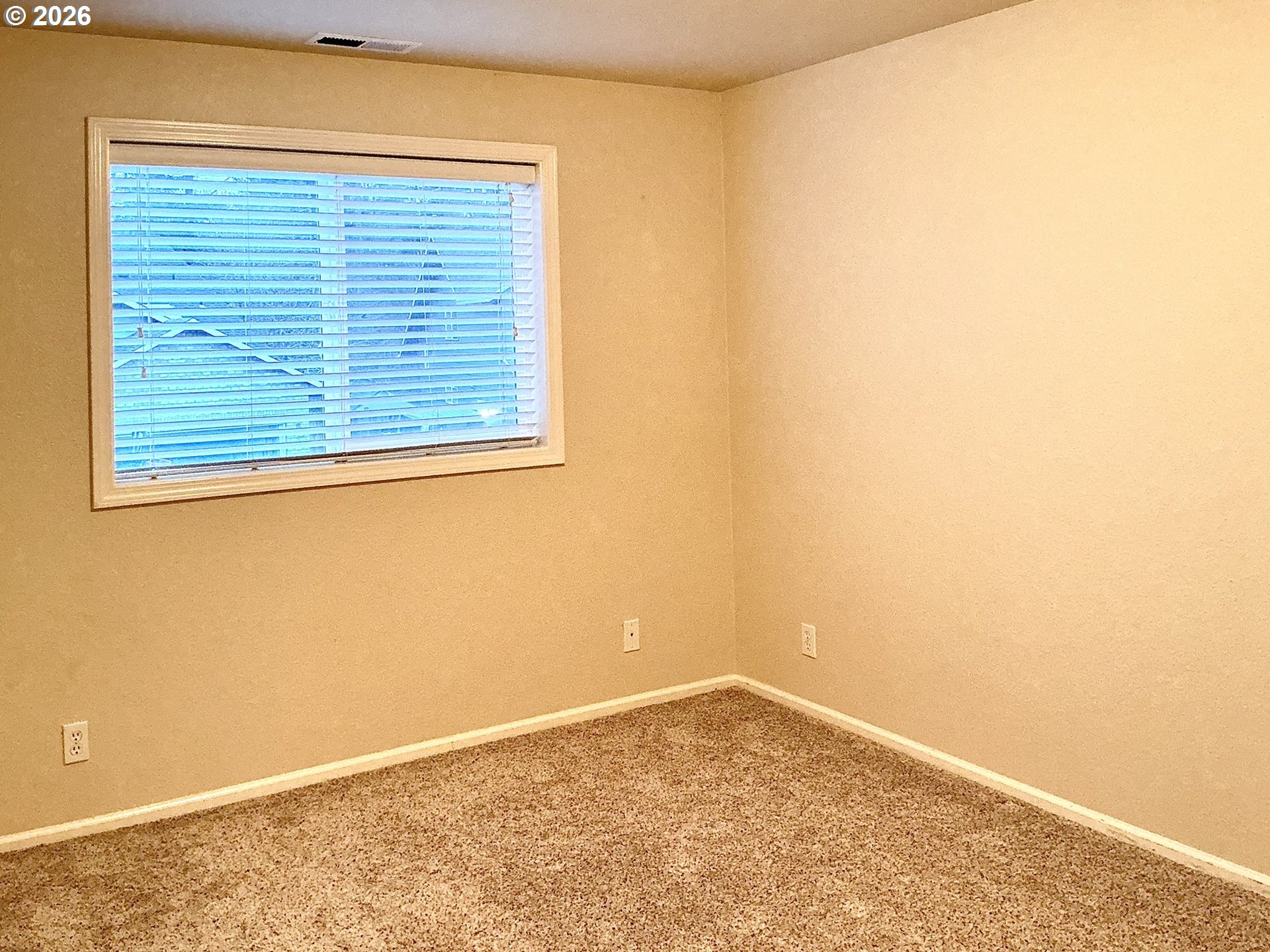 25335 Trinity Street Veneta, OR 97487 - Photo 19 of 27 an empty room with a window