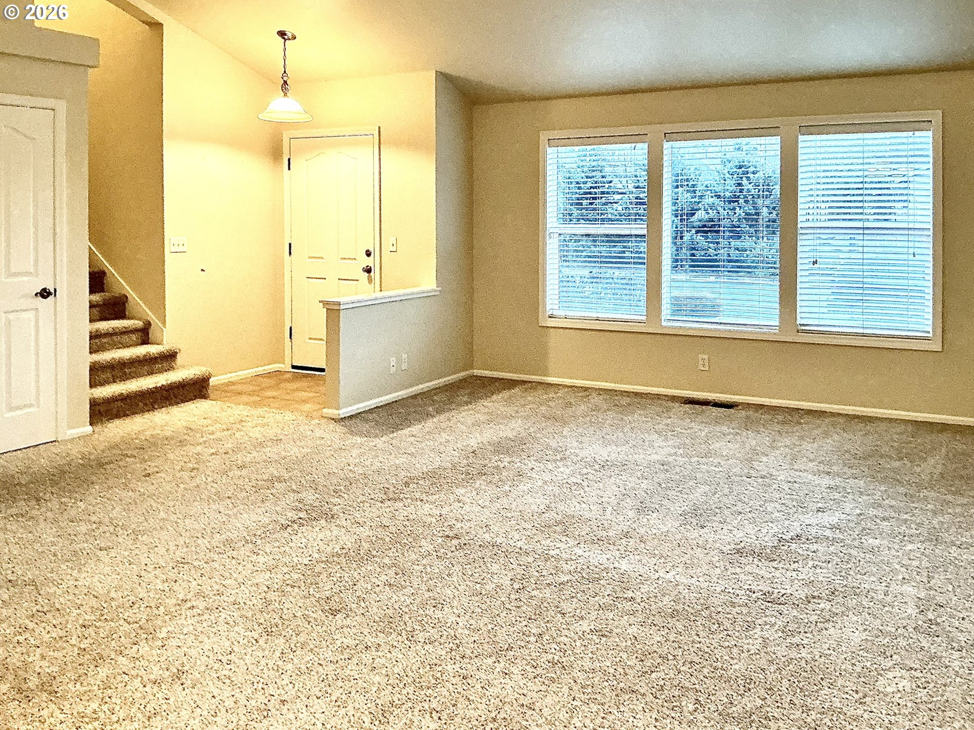 25335 Trinity Street Veneta, OR 97487 - Photo 3 of 27 a view of an empty room with a window