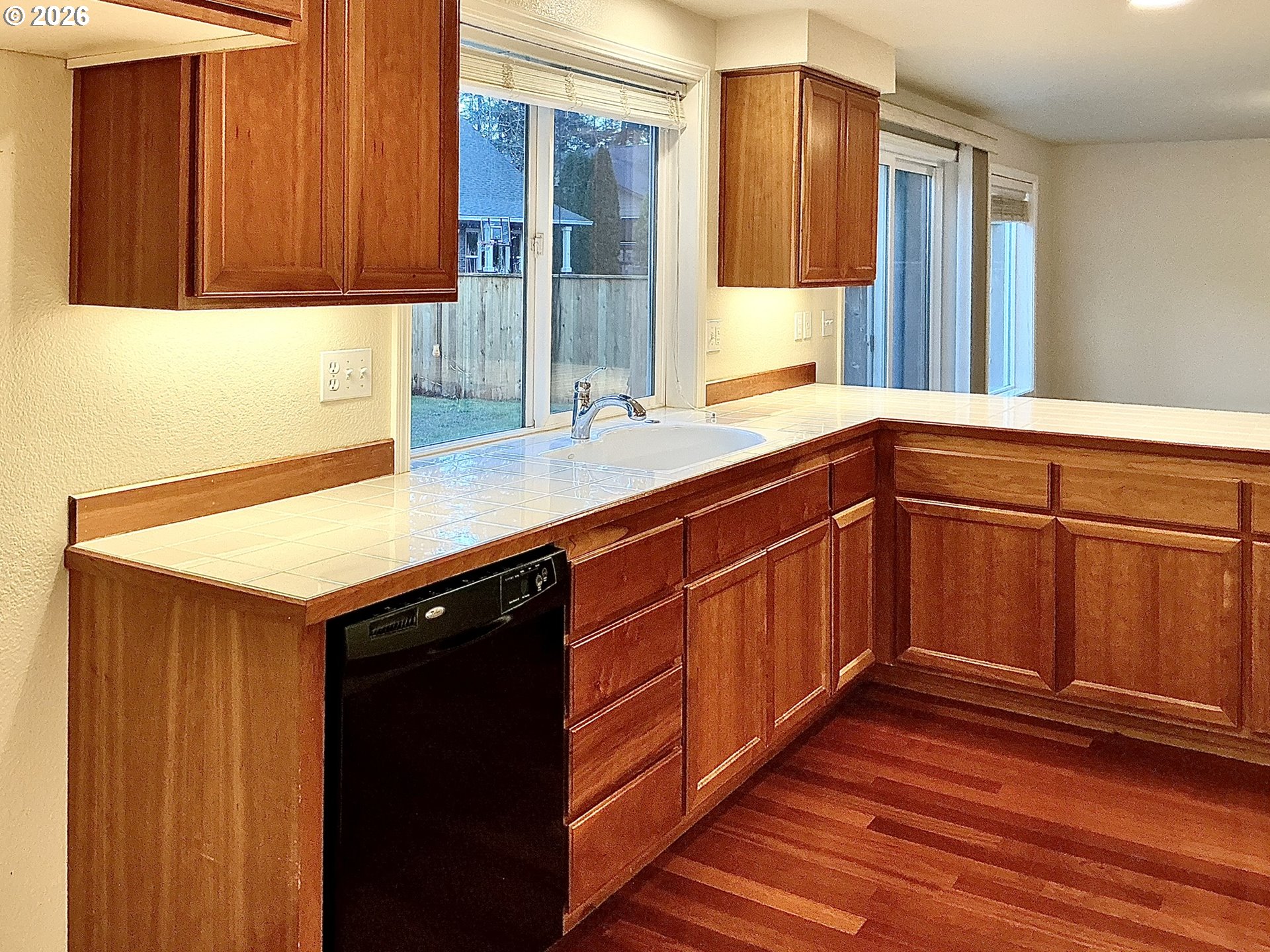 25335 Trinity Street Veneta, OR 97487 - Photo 6 of 27 a kitchen with wooden cabinets and sink