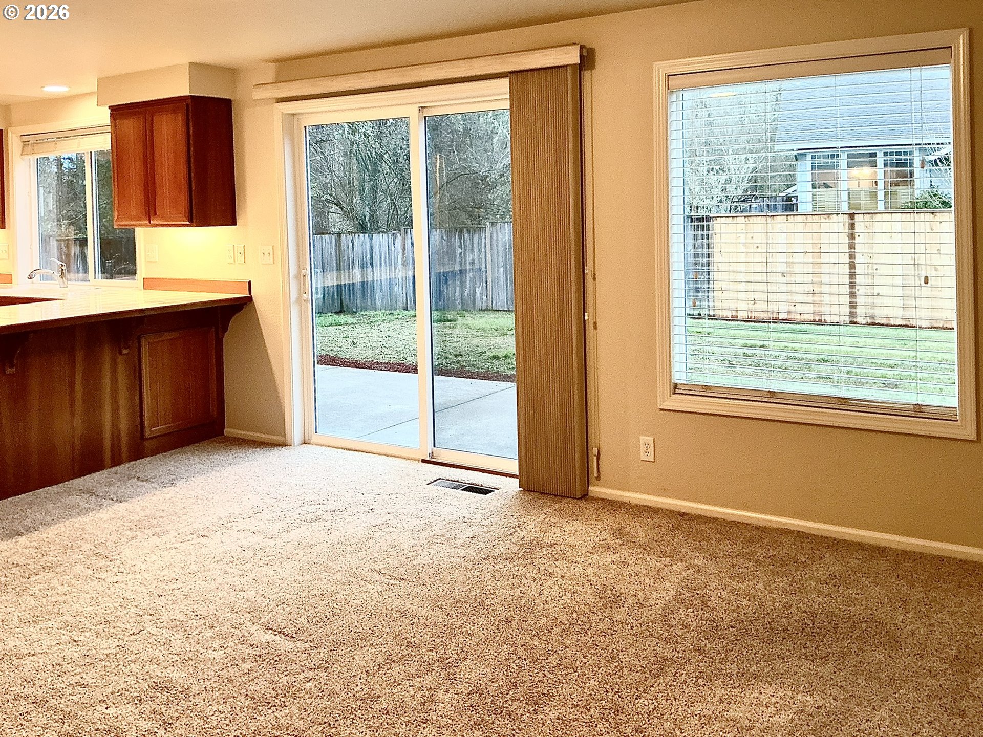 25335 Trinity Street Veneta, OR 97487 - Photo 9 of 27 a view of an empty room with a window