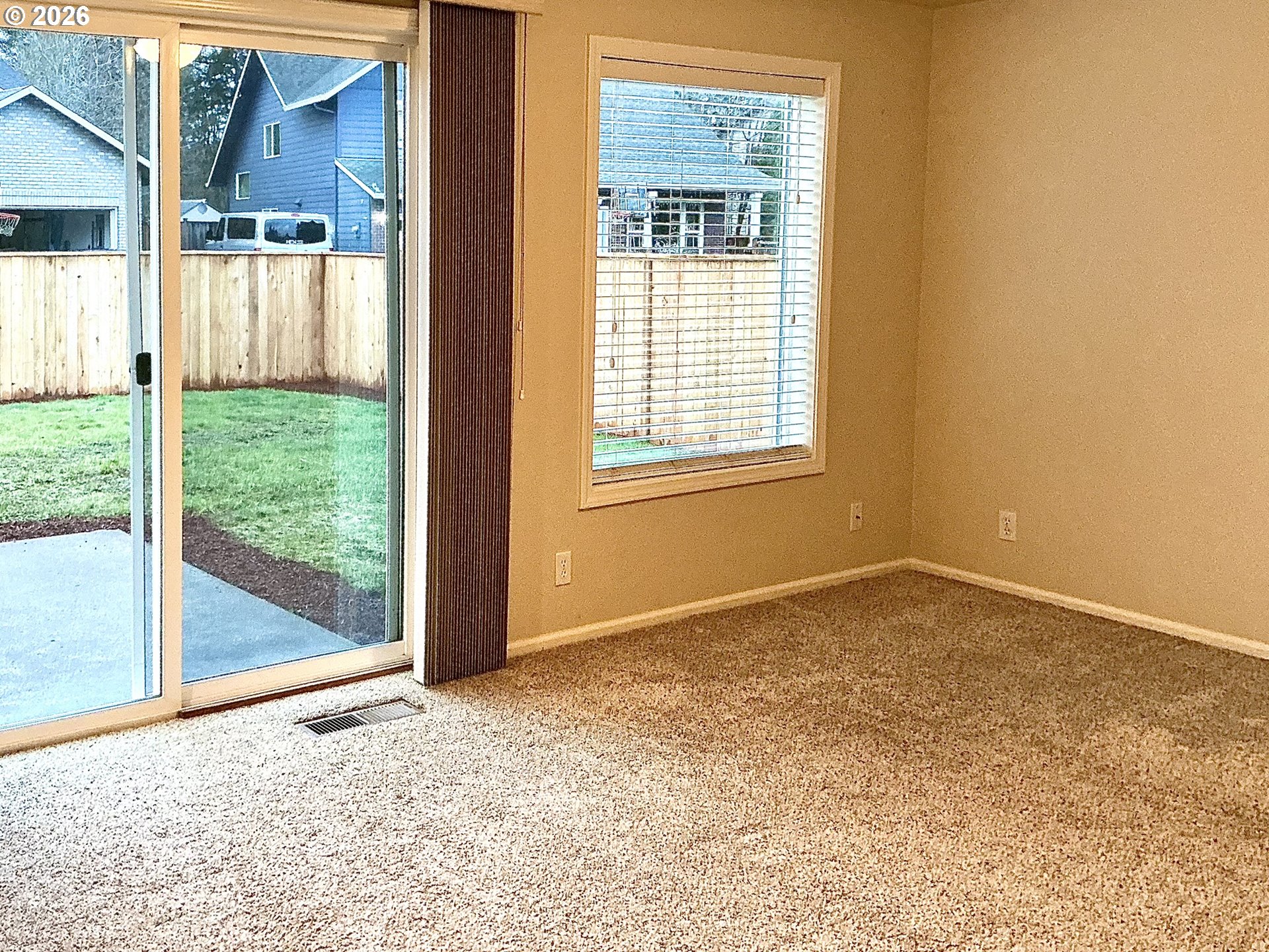 25335 Trinity Street Veneta, OR 97487 - Photo 10 of 27 a view of an empty room and window