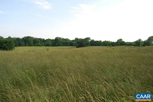 a view of an ocean and mountain