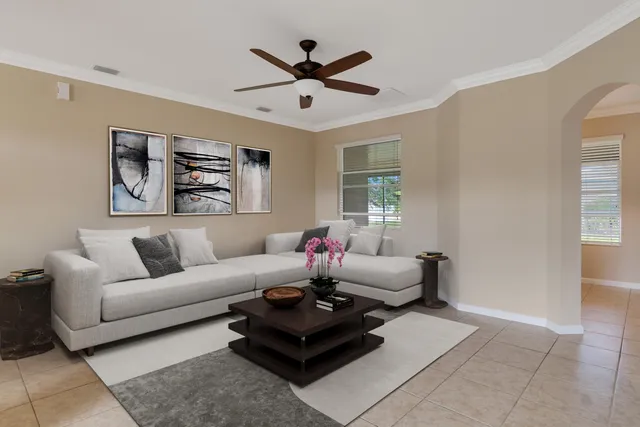 a living room with furniture and window