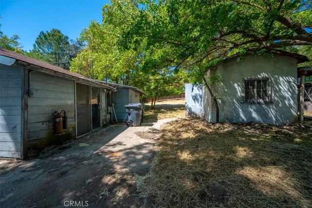 a backyard of a house with lots of green space