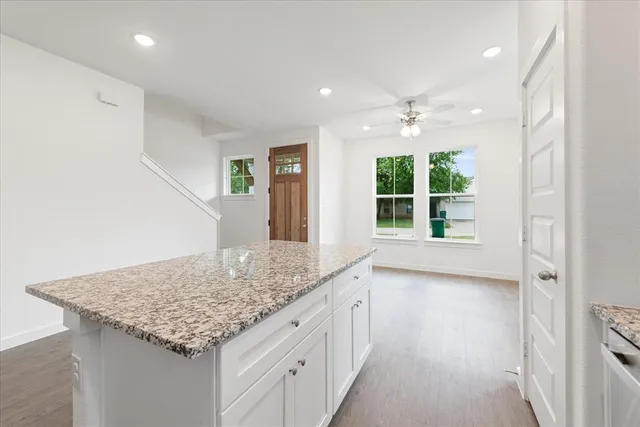 a kitchen with a stove and a microwave