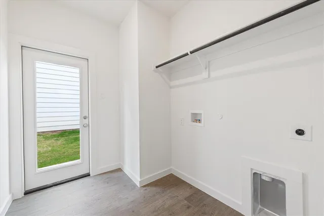 a kitchen with stainless steel appliances granite countertop a sink and a granite counter tops
